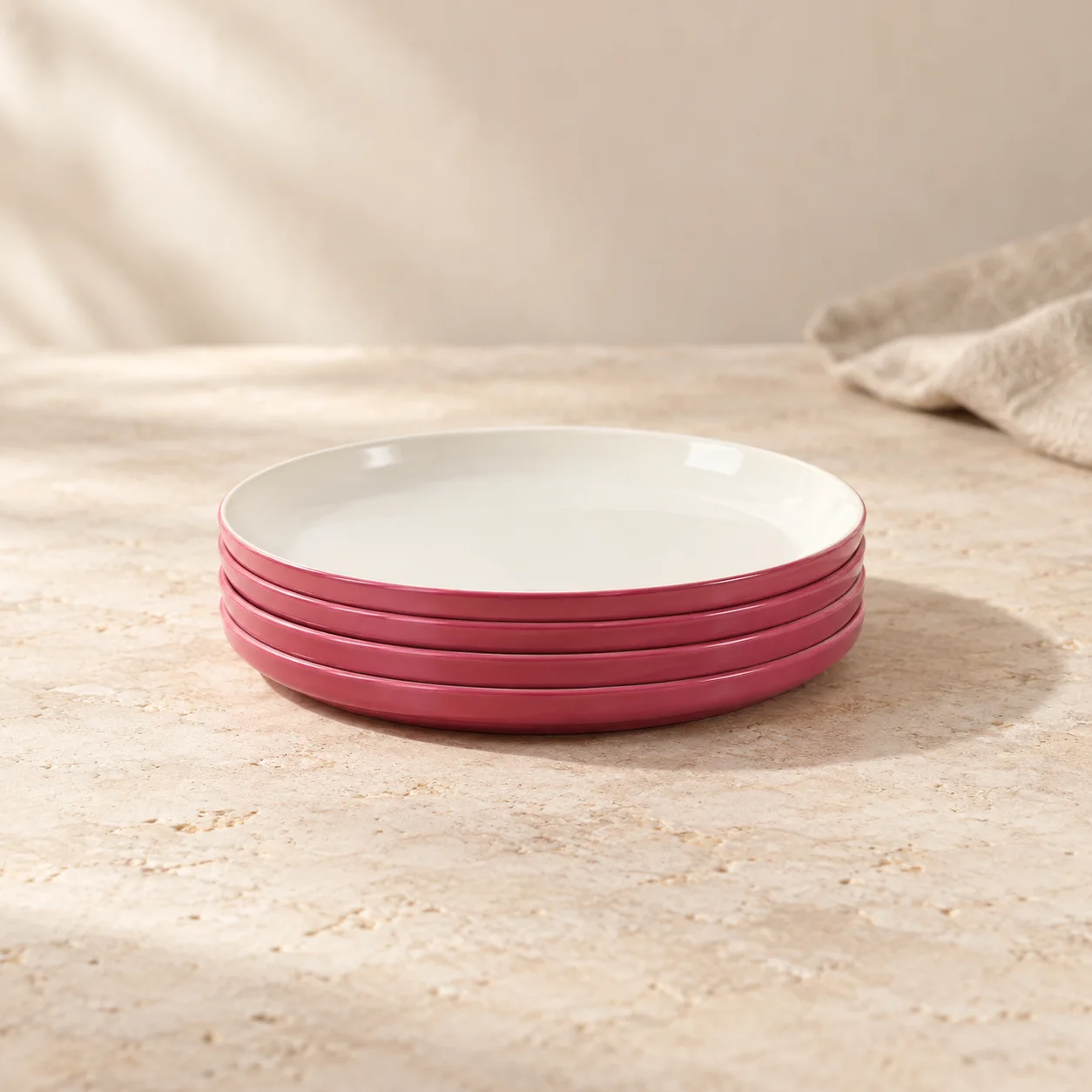 Stack of berry pink Side Plates